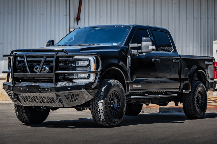 Bodyguard grille guard bumper for Ford Super Duty with front protection features.