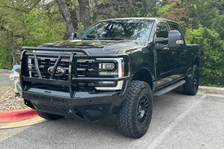 Bodyguard grille guard bumper for Ford Super Duty with front protection features.