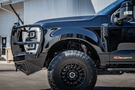 Bodyguard grille guard bumper for Ford Super Duty with front protection features.