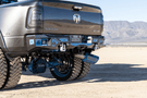 Heavy duty rear bumper with parking sensor cutouts mounted on a 2019–2026 Ram 2500/3500