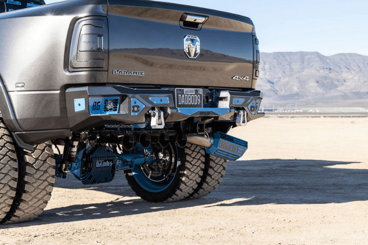 Heavy duty rear bumper with parking sensor cutouts mounted on a 2019–2026 Ram 2500/3500