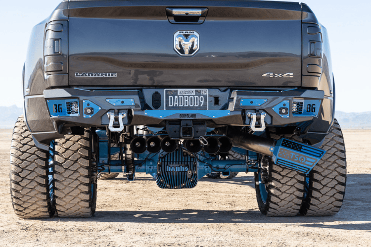 Heavy duty rear bumper with parking sensor cutouts mounted on a 2019–2026 Ram 2500/3500