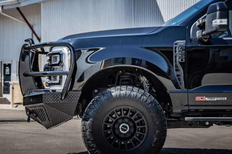 Truck front bumper with Bodyguard grille guard design for Ford Super Duty.