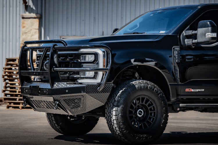 Truck front bumper with Bodyguard grille guard design for Ford Super Duty.