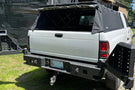 Aftermarket rear bumper Chassis Unlimited CUB960051 Octane dual swing setup upgrades a 1994-2002 Dodge Ram 1500 offroad utility