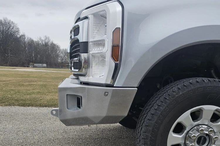 Chassis Unlimited CUB980752RAW steel front bumper on 2023+ Ford Super Duty F250/F350 with raw finish, winch mount and light cutouts