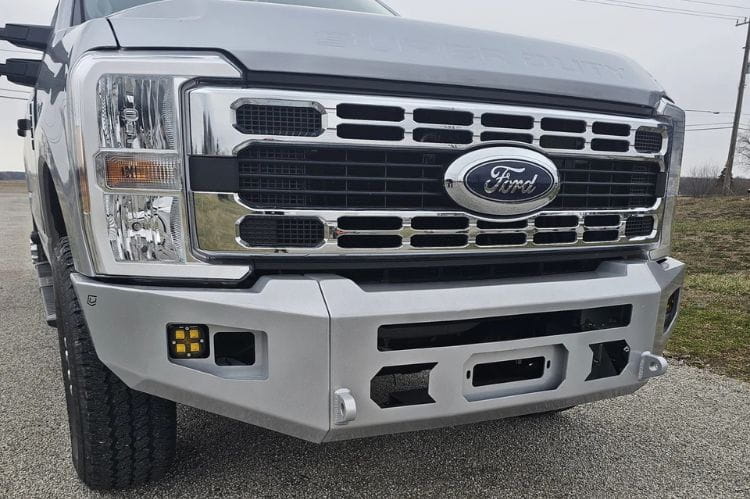 Chassis Unlimited CUB980752RAW steel front bumper on 2023+ Ford Super Duty F250/F350 with raw finish, winch mount and light cutouts