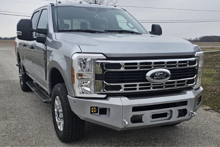 Chassis Unlimited CUB980752RAW steel front bumper on 2023+ Ford Super Duty F250/F350 with raw finish, winch mount and light cutouts