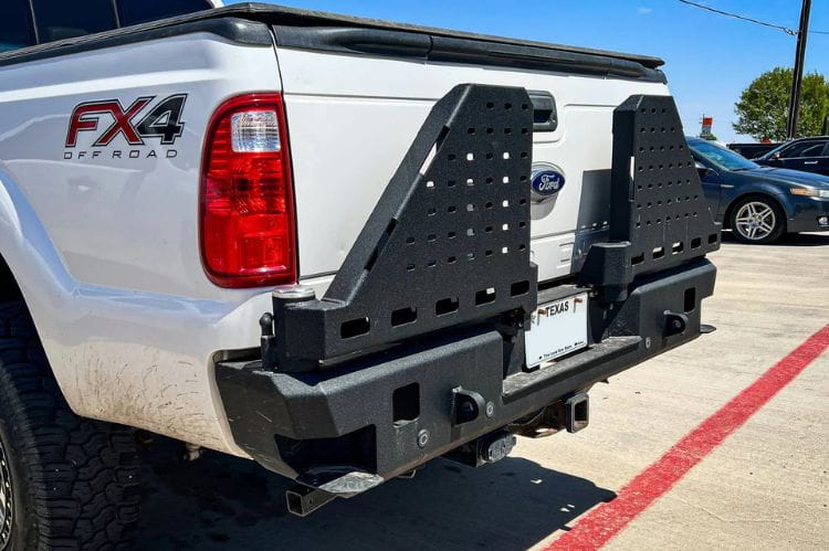 Dual swing out rear bumper CUB960121RAW by Chassis Unlimited for 1999–2016 Ford F250/F350 Superduty with a rugged raw steel finish