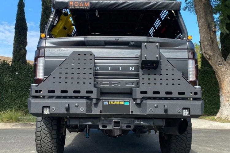 Chassis Unlimited CUB960752 dual swing out rear bumper with tire carrier for 2023+ Ford F250/F350 Super Duty rugged utility build.