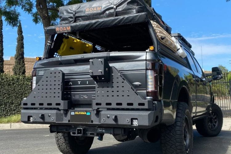 Chassis Unlimited CUB960752 dual swing out rear bumper with tire carrier for 2023+ Ford F250/F350 Super Duty rugged utility build.