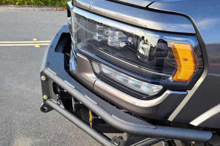 Chassis Unlimited Diablo CUB950322 front bumper for 2019–2025 Ram 2500/3500 with textured black finish and sensor cutouts