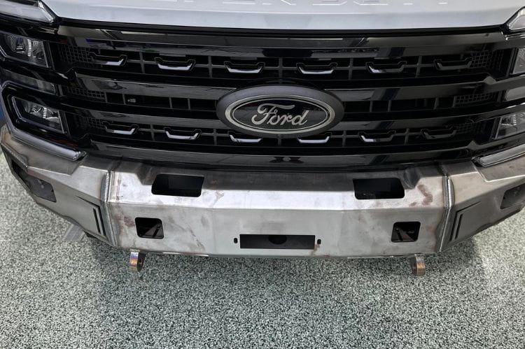 Chassis Unlimited CUB940751RAW front winch bumper for 2023+ Ford F250/F350 Super Duty with raw steel build and cube light mounts