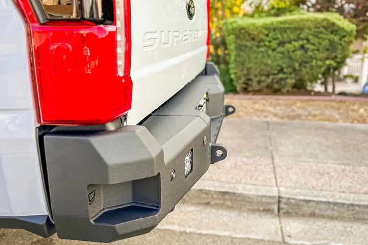 Chassis Unlimited CUB990751RAW heavy duty rear truck bumper for 2023+ Ford Super Duty F250/F350 with raw steel finish, cube lights and steps.