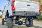 Chassis Unlimited CUB990751RAW heavy duty rear truck bumper for 2023+ Ford Super Duty F250/F350 with raw steel finish, cube lights and steps.
