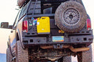 Chassis Unlimited Octane CUB960012 aftermarket rear bumper with dual swing-out tire carrier for 2010–2025 Ram 2500/3500, textured black