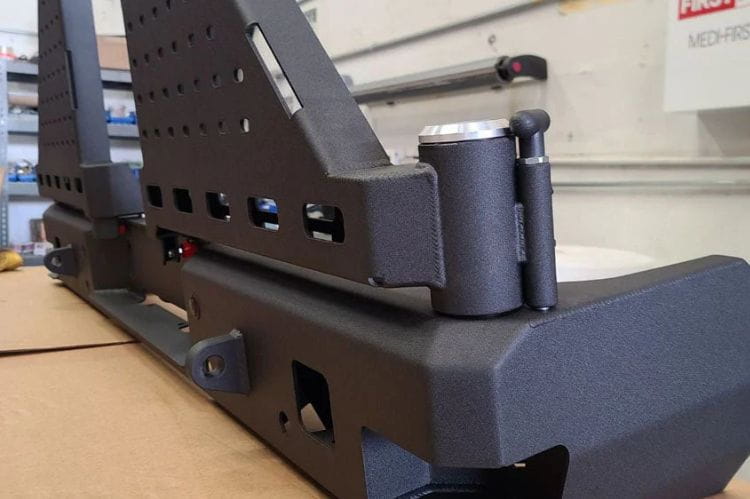 Chassis Unlimited Octane CUB960012RAW custom rear bumper with dual swing-out tire carrier for 2010–2025 Ram 2500/3500, raw steel