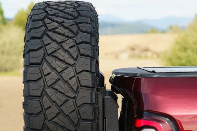 Chassis Unlimited Octane CUB960012RAW custom rear bumper with dual swing-out tire carrier for 2010–2025 Ram 2500/3500, raw steel