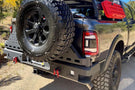 Chassis Unlimited Octane CUB960011RAW custom truck rear bumper with dual swing-out tire carrier for 2010–2025 Ram 2500/3500, raw steel