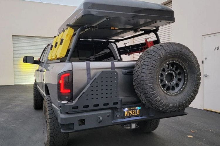 Chassis Unlimited Octane dual swing out rear bumper CUB960021 for 2003–2009 Ram 2500/3500 with black powder coat finish