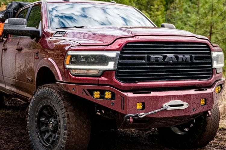 Chassis Unlimited Octane CUB940322 front bumper for 2019–2025 Ram 2500/3500 with textured black finish and sensor cutouts