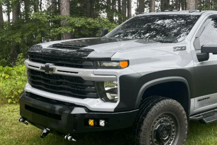Chassis Unlimited Octane Front Bumper CUB940732 equips a 2024+ Chevy Silverado 2500/3500 with textured black steel