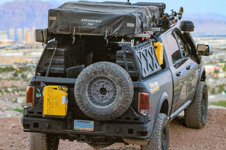 Chassis Unlimited Octane CUB960011 steel rear bumper with dual swing-out tire carrier for 2010–2025 Ram 2500/3500, textured black