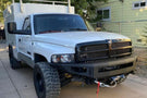 Offroad front winch bumper Chassis Unlimited CUB940051 Octane texture black steel protects a 1994-2002 Dodge Ram 1500 on the trail 