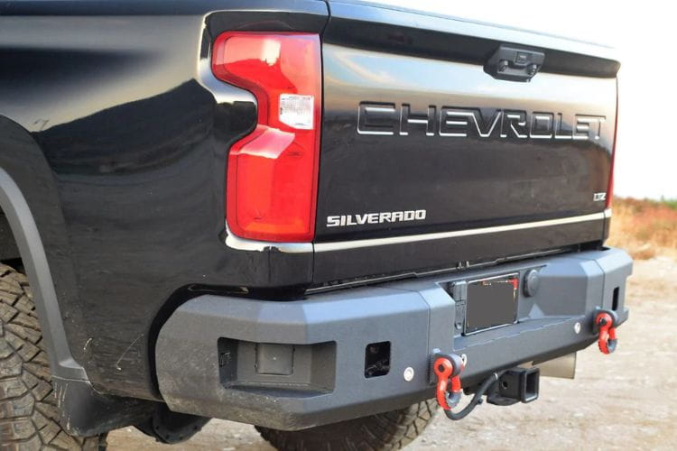 The bare steel Chassis Unlimited rear bumper CUB990552RAW adds sensor cutouts to a 2020-2025 Chevy Silverado 2500/3500 truck 