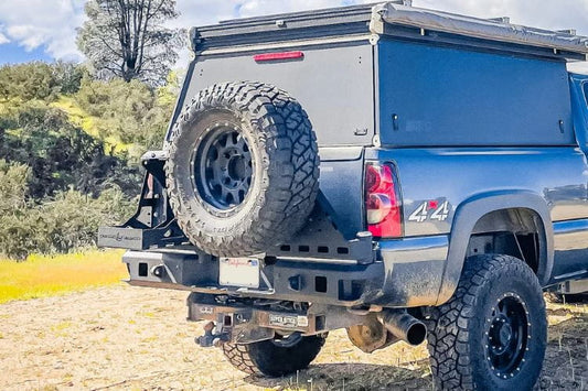 Chassis Unlimited CUB960251 swing out rear bumper for 1999-2007 GMC Sierra 1500 steel build with recovery points and dual swing arms.