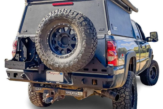 Chassis Unlimited CUB960251 rear bumper for 1999-2007 GMC Sierra 2500/3500 dual swing tire carrier black powder coat LED cutouts.