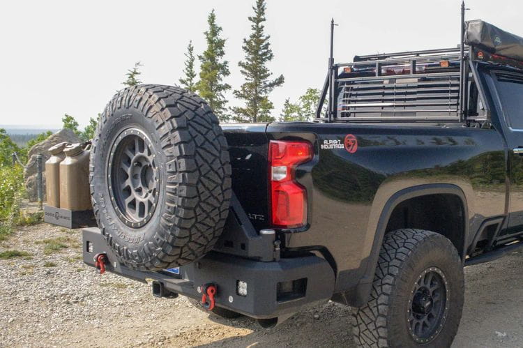 Chassis Unlimited rear tire carrier bumper CUB960572. Dual swing-out 2020–2025 Chevy Silverado 2500/3500, sensors, textured black