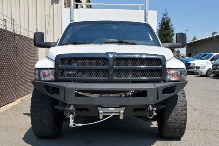 Steel front bumper with winch mount Chassis Unlimited CUB940051RAW bare paintable armor upgrades a 1994-2002 Dodge Ram 1500 profile