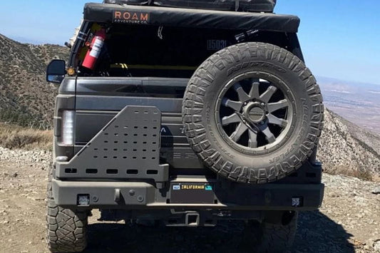 Bumper with tire carrier Chassis Unlimited CUB960751RAW raw steel rear protection with LED mounts for 2023+ Ford F250/F350 trucks.