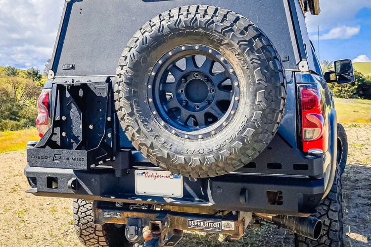 Swing out tire carrier CUB960251RAW by Chassis Unlimited features a raw steel octane rear bumper for 1999-2007 GMC Sierra 1500