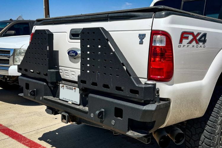 Swing out tire carrier rear bumper CUB960122 by Chassis Unlimited for 1999-2016 Ford Superduty, featuring a texture black finish
