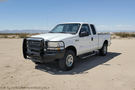 2004 Ford F250 Super Duty with Ranch Hand front and rear bumpers and Westin side steps installed
