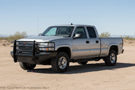 2007 Chevy Silverado 2500 Complete Protection Kit featuring rugged Fab Fours bumpers and stylish Westin Automotive steps