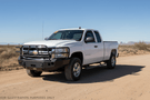 2007 Chevy Silverado 2500HD Complete Protection Kit with Hammerhead bumpers and AMP Research steps for a powerful upgrade