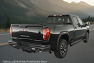 Upgraded 2023 GMC Sierra 2500HD featuring tough Fab Fours bumpers and sleek AMP Research steps