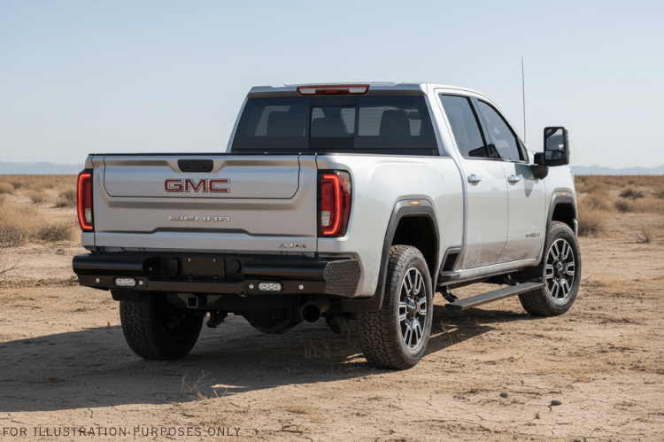 Upgraded 2023 GMC Sierra 2500HD featuring tough Fab Fours bumpers and sleek AMP Research steps