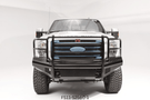 2016 F250 Super Duty outfitted with Fab Fours bumpers and Aries steps, giving the truck a tough, battle-ready look