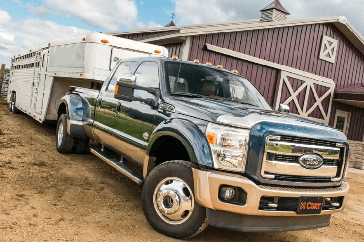 CURT folding ball gooseneck hitch 61052 for 2011-2019 Chevy Silverado 2500 and 3500 HD trucks, a durable over-bed towing solution