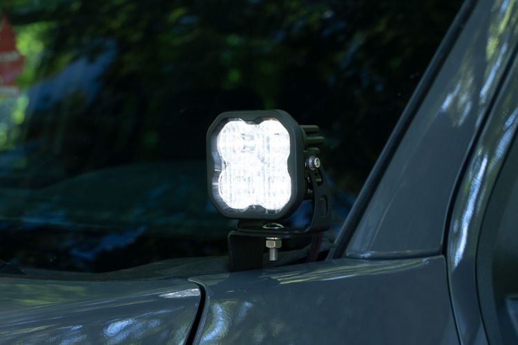 Diode Dynamics SS3 sport LED pods DD6865P yield a creative, bright driving path for this custom heavy-duty truck setup 