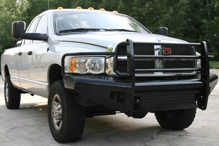 Fab Fours DR03-S1060-1 black steel front bumper full guard for Dodge Ram 2500/3500 2003–2005.