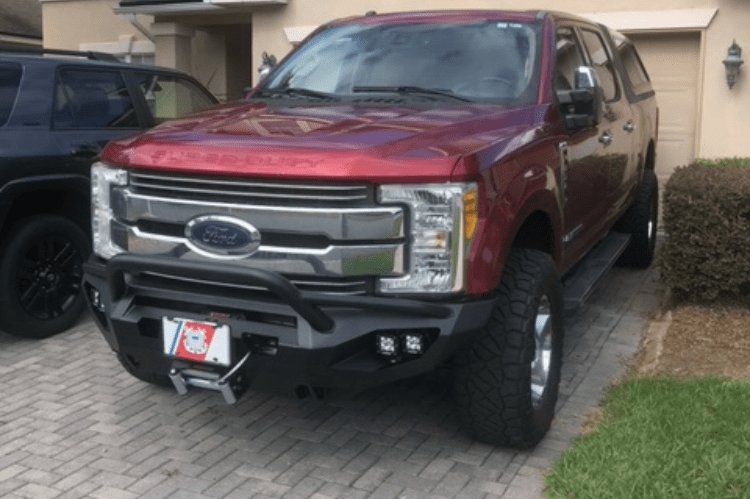 Fab Fours FS17-X4152-1 Matrix Front Bumper for 2017-2022 Ford F250/F350 Super Duty, winch-ready design with a pre-runner guard, providing rugged durability and aggressive front-end protection.