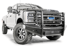 Fab Fours FS23-Q5960-1 Black Steel Elite Full Guard Front Bumper installed on a 2023 Ford F-250 Super Duty, featuring a matte black powder-coated finish, full grille guard, sensor compatibility, and mounts for 3x3 LED cube lights.