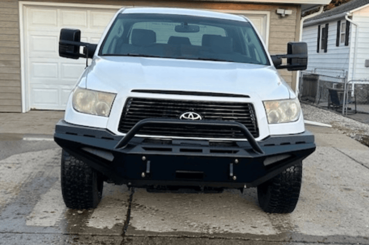 Fab Fours Red Steel TT07-RS1862-1 Front Bumper with Winch Ready Pre-Runner Guard for 2007-2013 Toyota Tundra.