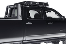 Fab Fours Universal Roof Rack 48" RR48-1 with 2-stage matte black powder coat finish installed on 1999–2016 Ford F250/F350 Super Duty, featuring a durable and stylish roof rack design