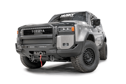 Fab Fours TL24-N6752-1 heavy duty front winch bumper with grille guard for 2024-2026 Toyota Land Cruiser; features hidden winch mount and pre-runner guard